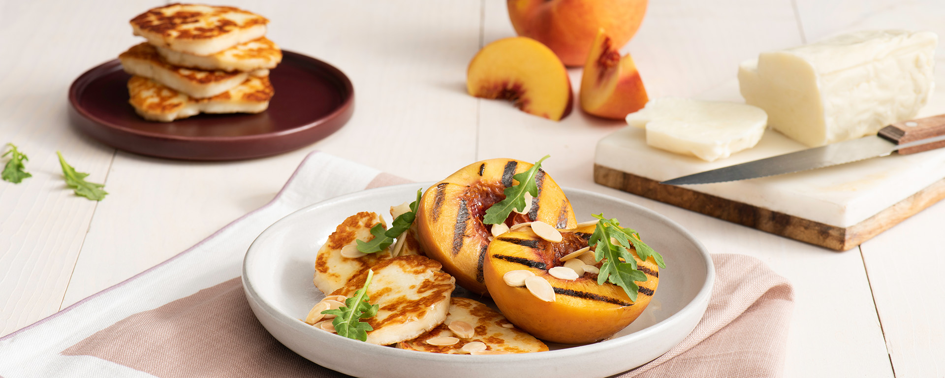 Photo of - Crispy Halloumi with Champagne Syrup and Grilled Peaches